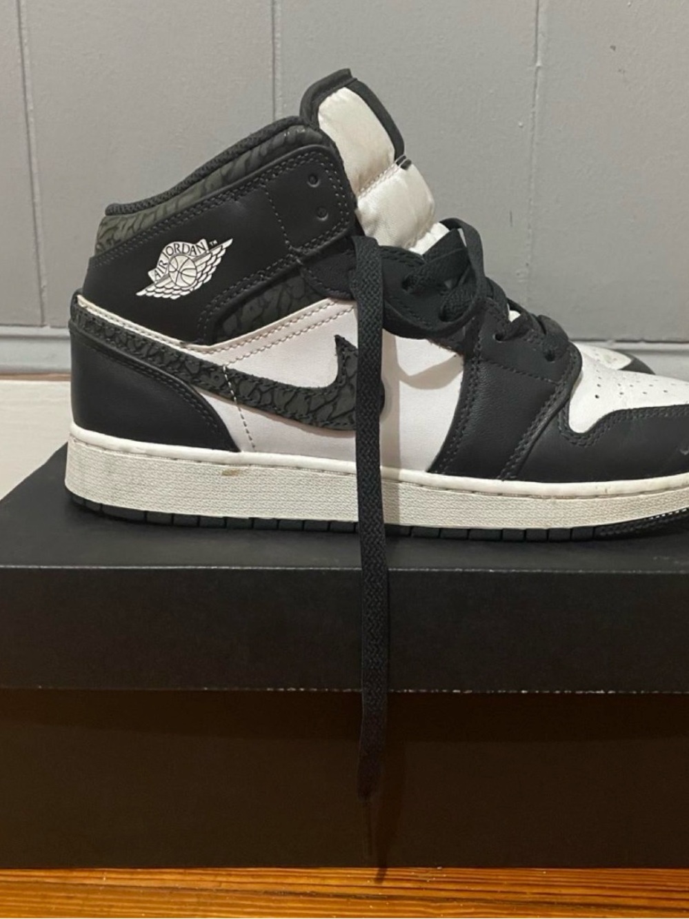 Jordan 1 Women's High-Top Sneakers in Black and White